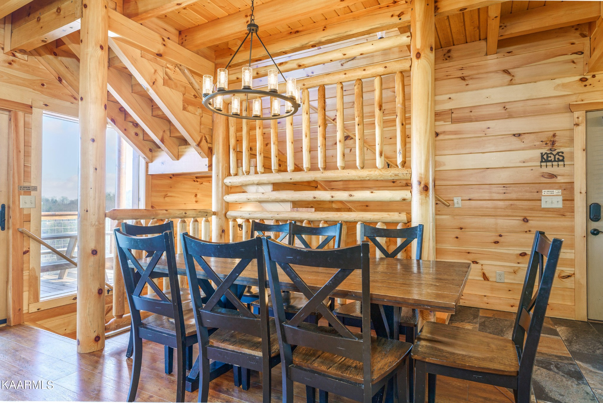 2805 White Oak Ridge Lane Sevierville, TN 37862 - Photo 11 of 25 a view of a dining room with furniture and wooden floor