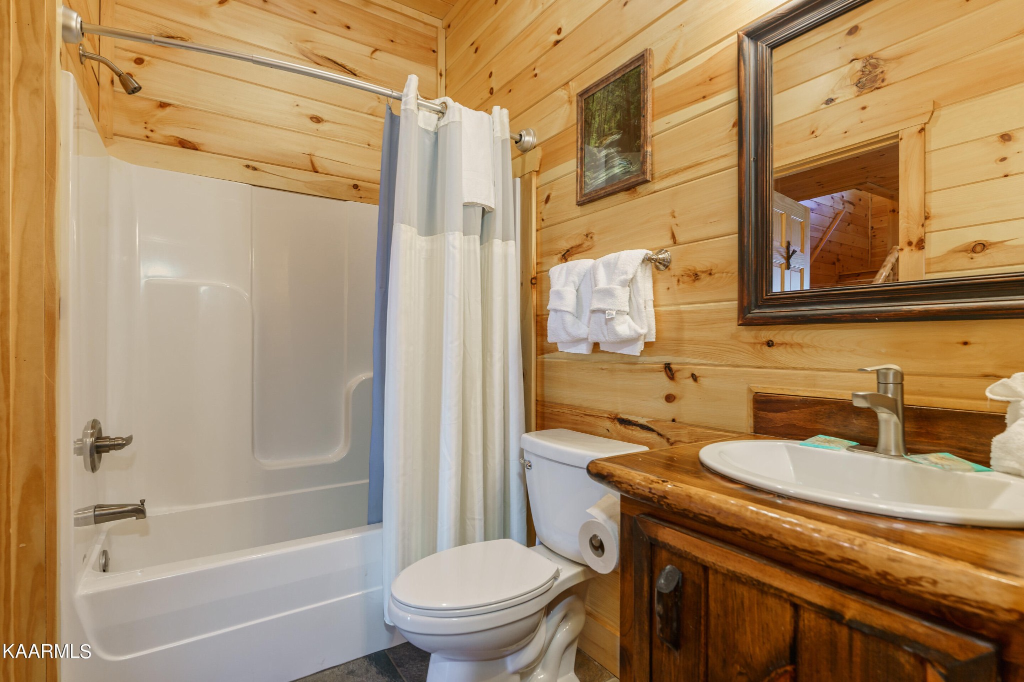 2805 White Oak Ridge Lane Sevierville, TN 37862 - Photo 16 of 25 a bathroom with a granite countertop sink toilet and shower