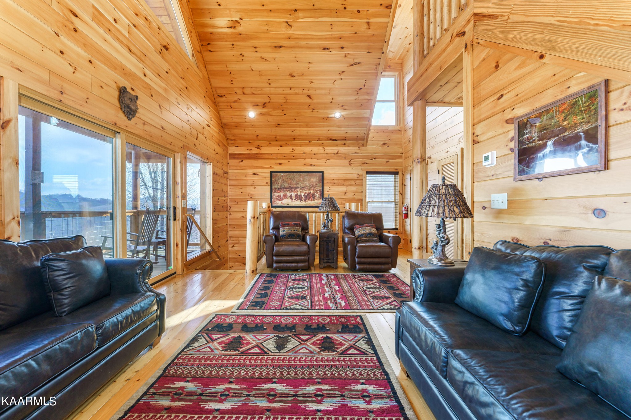 2805 White Oak Ridge Lane Sevierville, TN 37862 - Photo 3 of 25 a living room with furniture and a rug