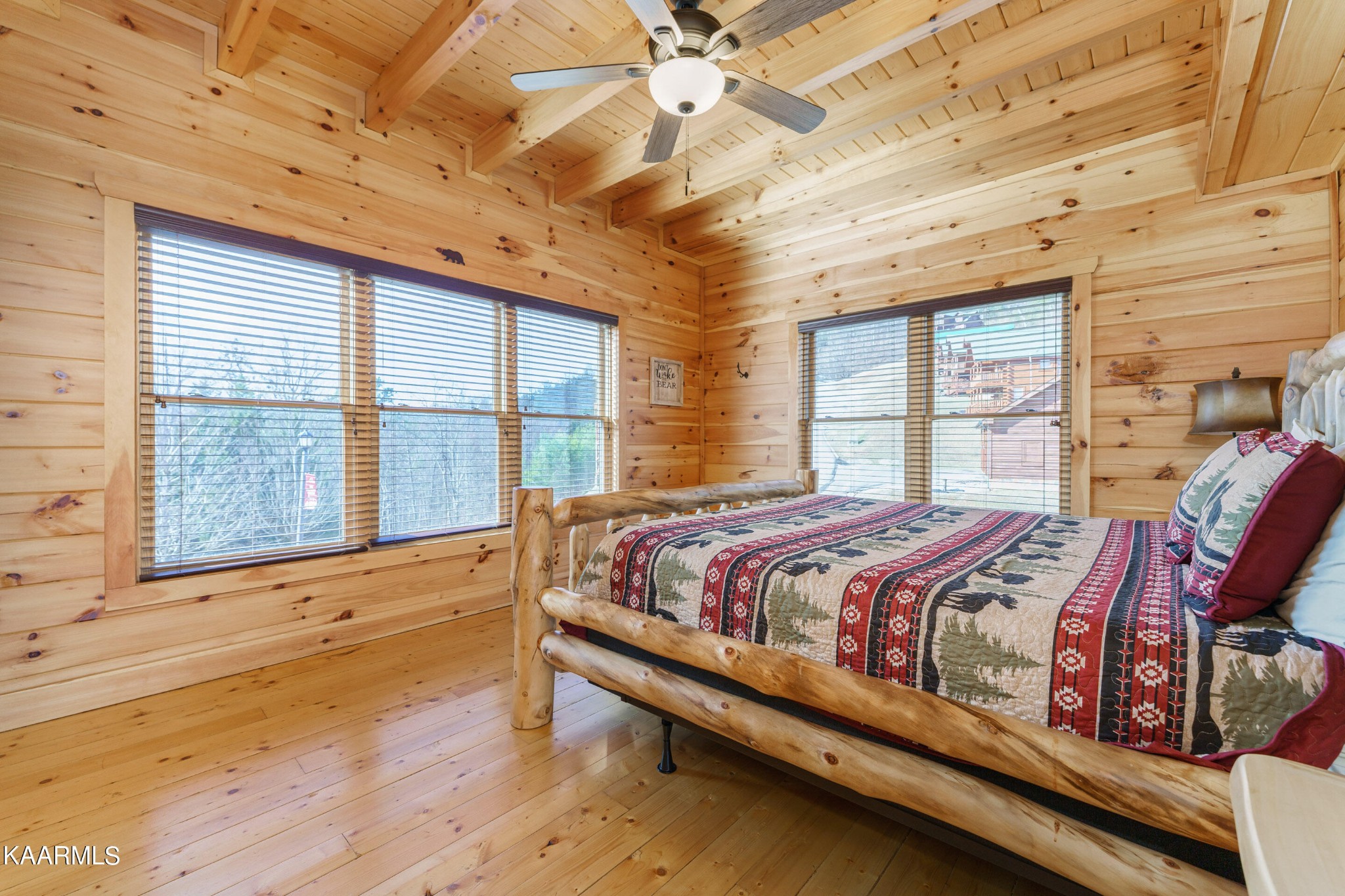 2805 White Oak Ridge Lane Sevierville, TN 37862 - Photo 6 of 25 a large bed sitting in a bedroom next to a window