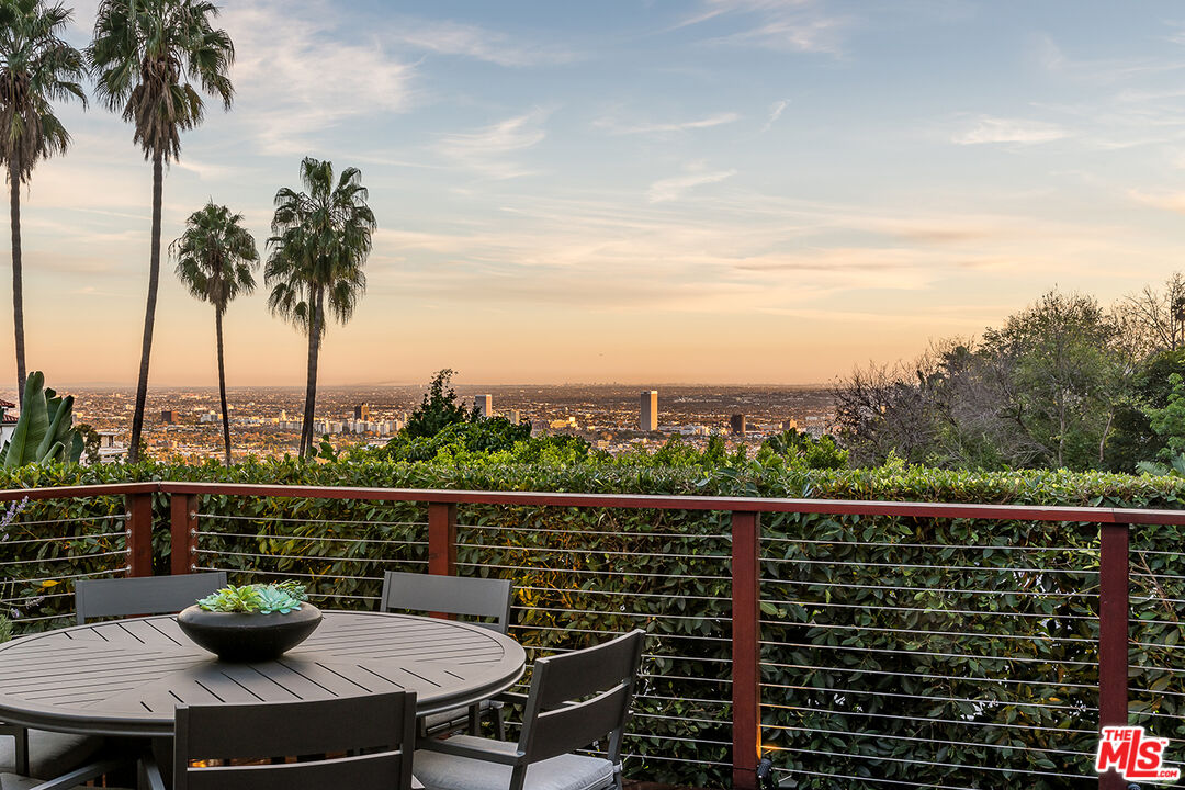 1633 Queens Road Los Angeles, CA 90069 - Photo 15 of 16 a view of a balcony with mountain view