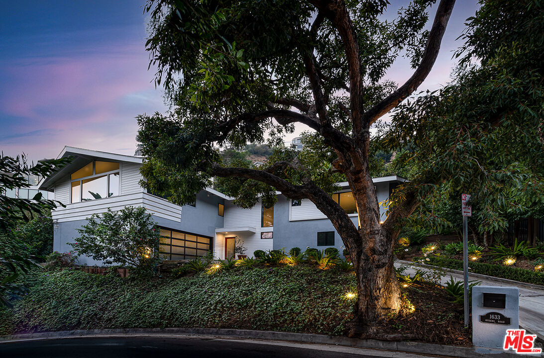 1633 Queens Road Los Angeles, CA 90069 - Photo 16 of 16 aerial view of a house with a tree in the background