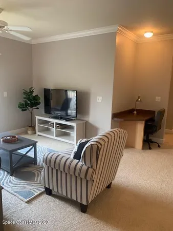 a bedroom with a bed and cabinets