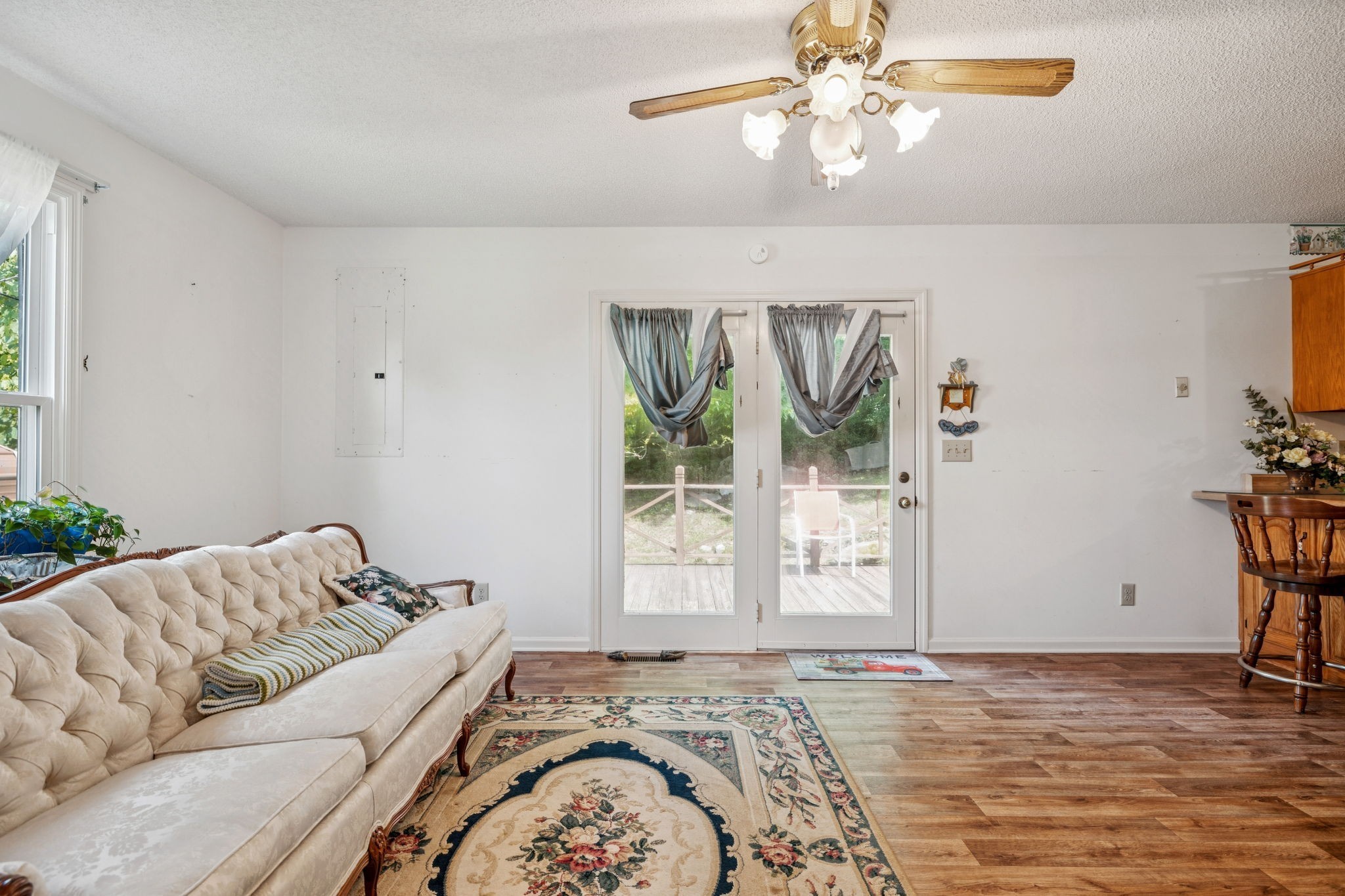 8663 Dog Branch Road Mount Pleasant, TN 38474 - Photo 11 of 42 a living room with a bed furniture and a window