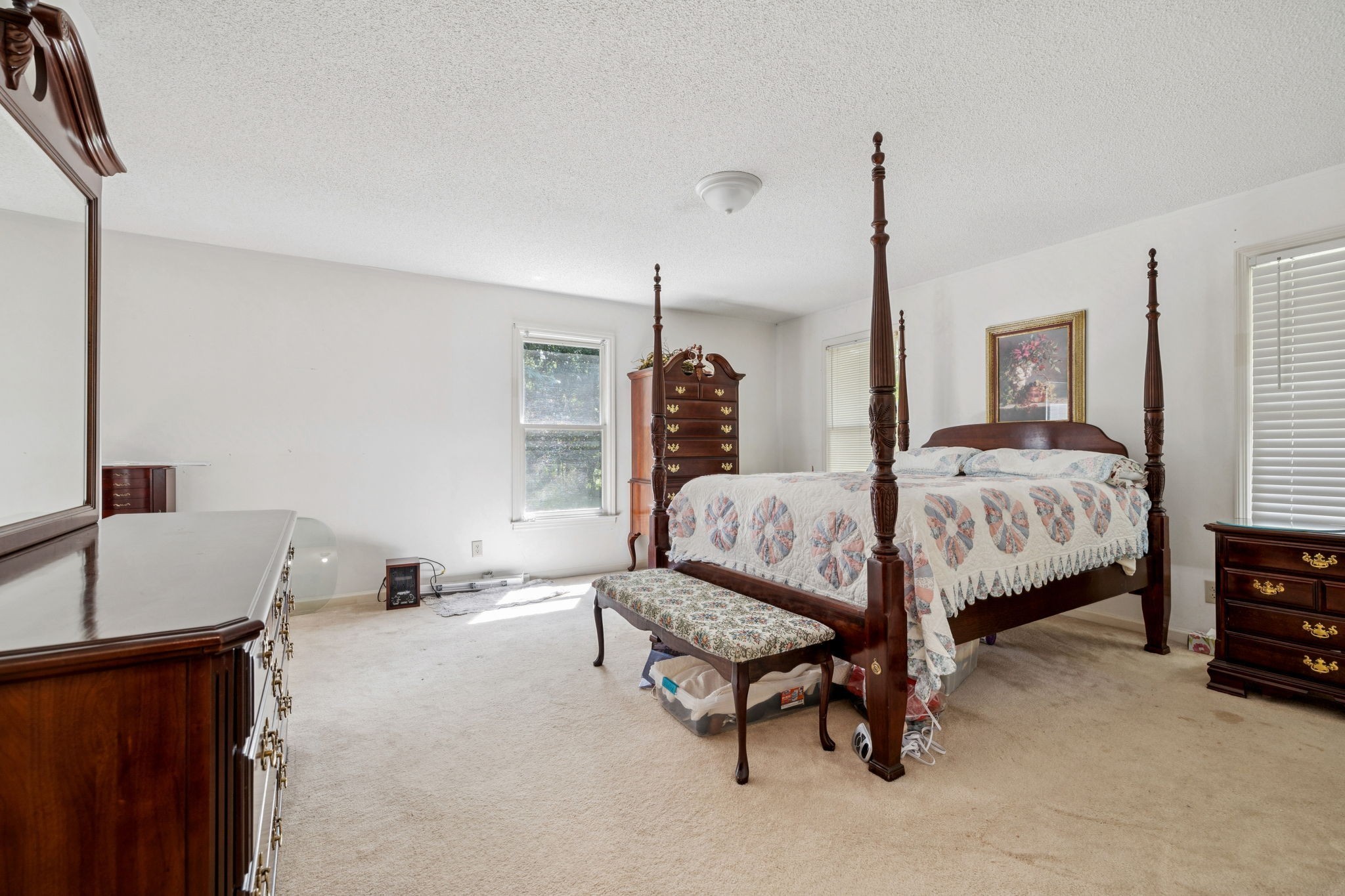 8663 Dog Branch Road Mount Pleasant, TN 38474 - Photo 23 of 42 a bedroom with a bed and a couch