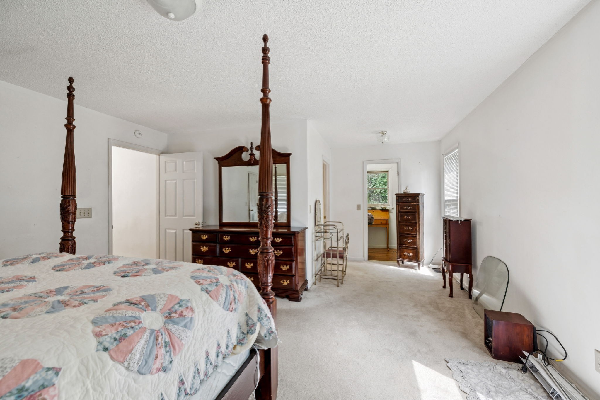 8663 Dog Branch Road Mount Pleasant, TN 38474 - Photo 24 of 42 a bedroom with a bed and dresser