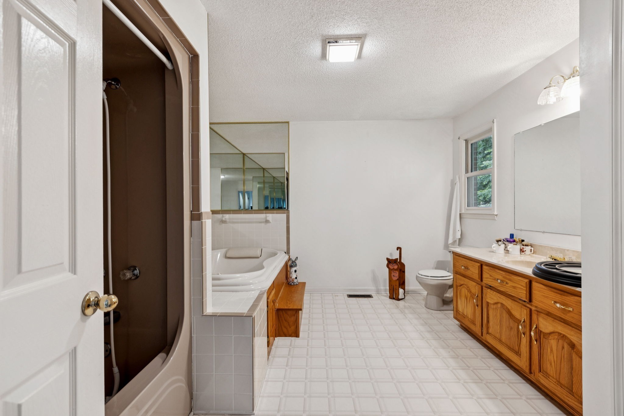 8663 Dog Branch Road Mount Pleasant, TN 38474 - Photo 25 of 42 a room with a bed and a wooden floor