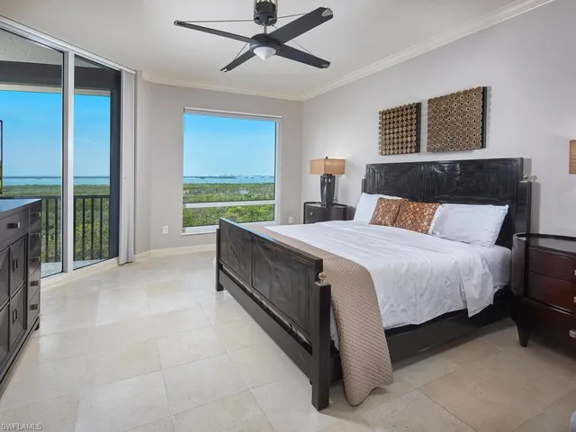 a bed room with a bed and a couch