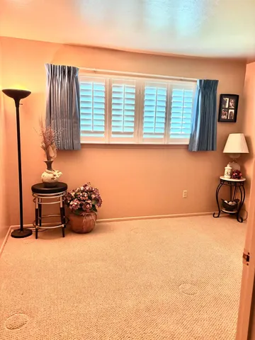 a room with furniture and a flat screen tv