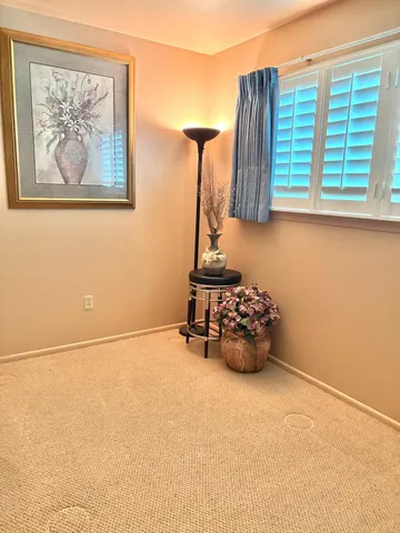 a room with furniture and a window