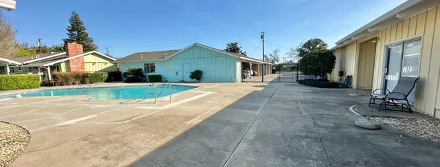 a view of a house with a patio
