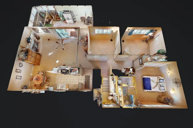 an aerial view of residential houses with outdoor space