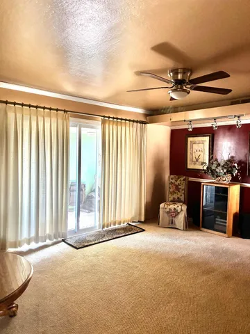 a view of a livingroom with furniture