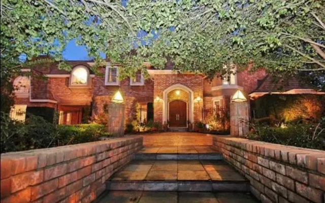 a view of swimming pool with outdoor seating and yard