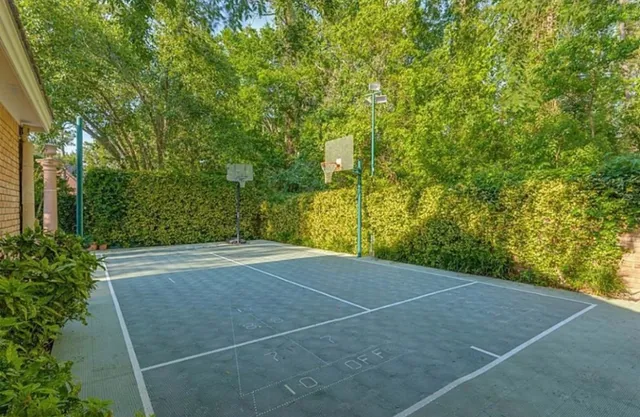 a view of outdoor space and basketball court