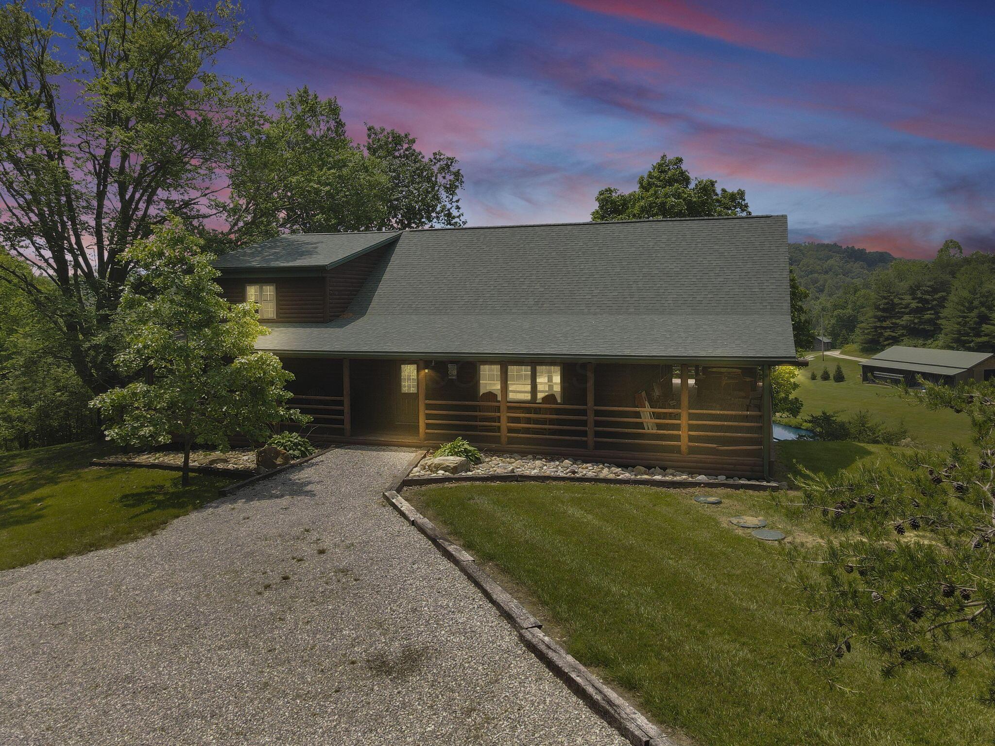 Welcome to 35640 Vickers Road, Logan, OH, a beautiful compound of cabins spanning nearly 25 acres of Hocking Hills paradise. Cabin #1 - The Kodiak Lodge