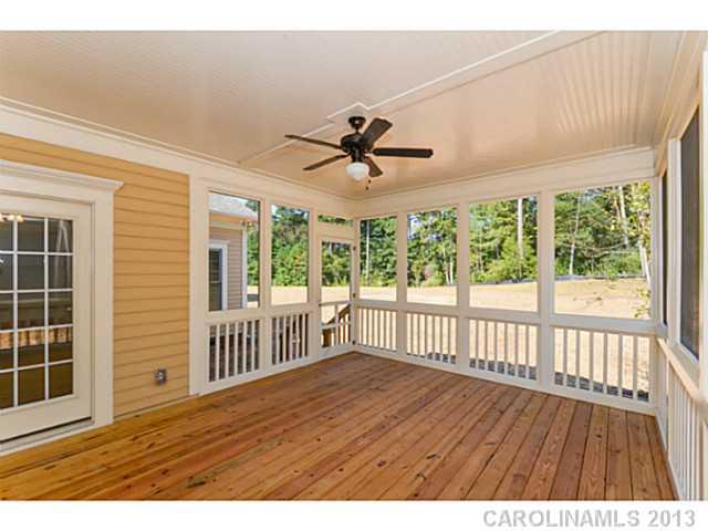 812 Elswick Court, Unit 1333 Fort Mill, SC 29708 - Photo 15 of 16 wooden floor in an empty room with a window