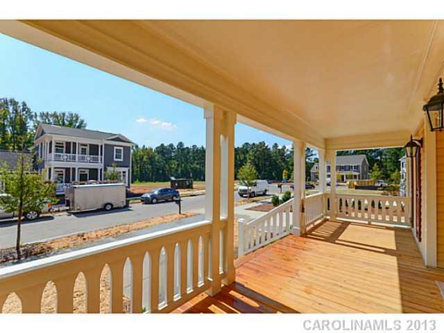 812 Elswick Court, Unit 1333 Fort Mill, SC 29708 - Photo 3 of 16 a view of a balcony with chairs