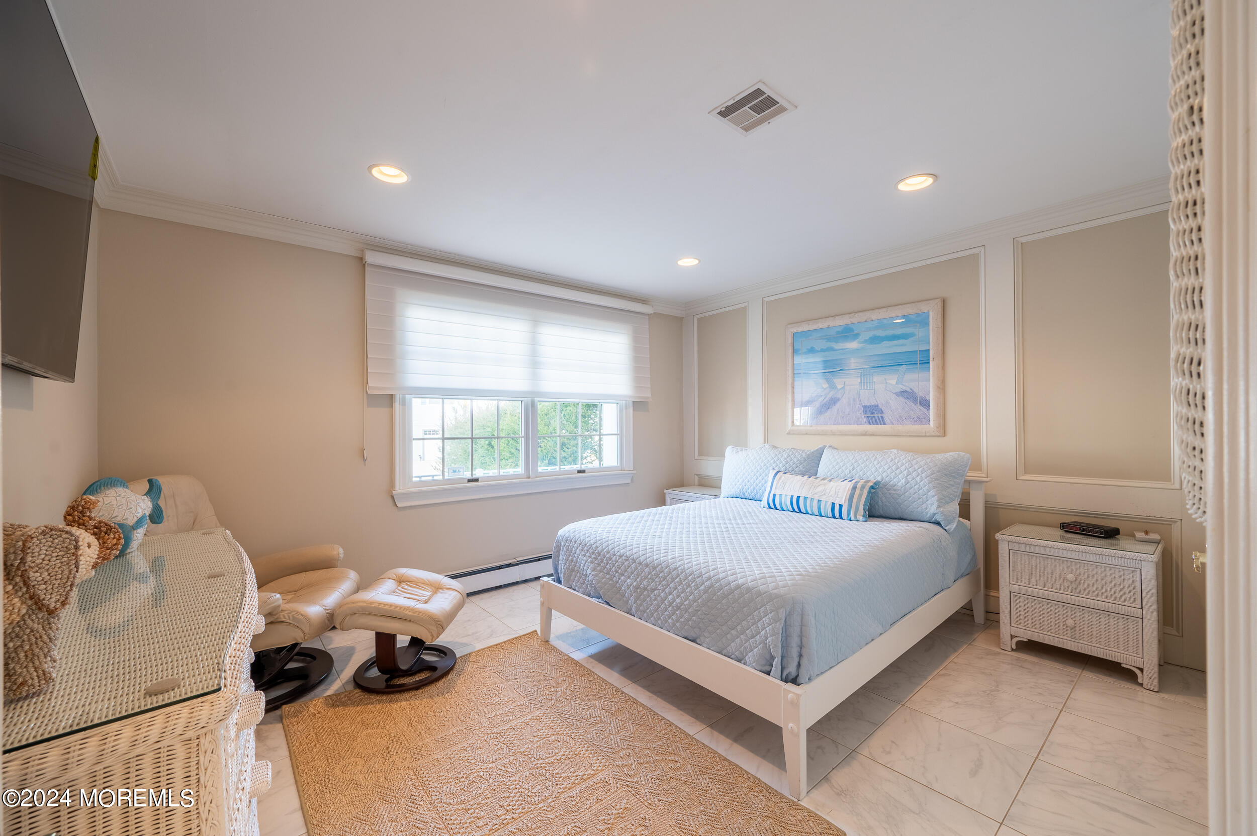409 6th Avenue Seaside Heights, NJ 08751 - Photo 12 of 39 a bedroom with a bed and a window