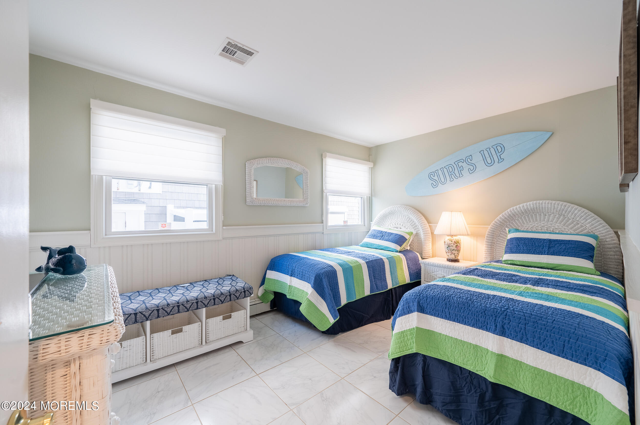 409 6th Avenue Seaside Heights, NJ 08751 - Photo 13 of 39 a bedroom with two beds and a window