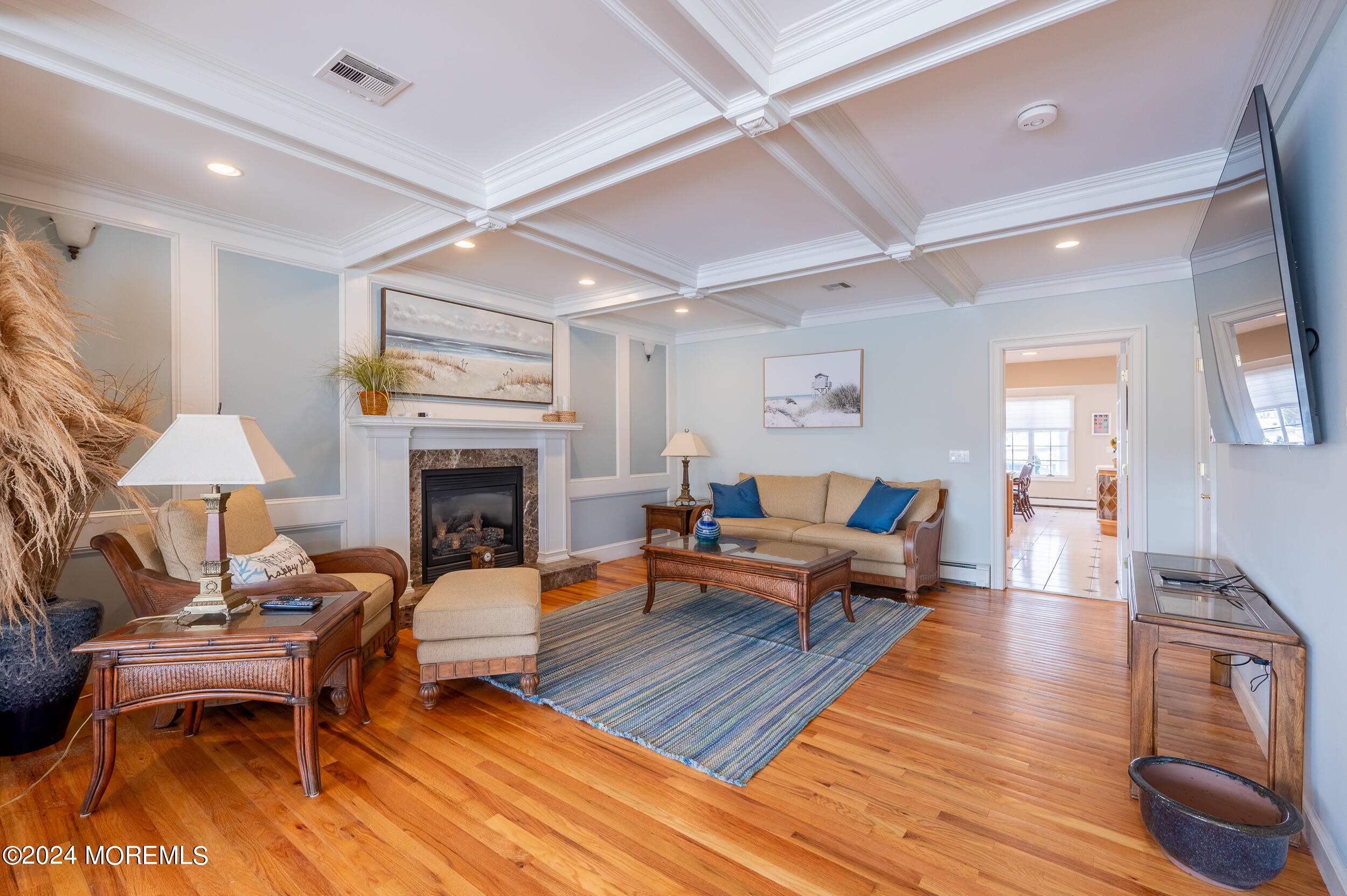 409 6th Avenue Seaside Heights, NJ 08751 - Photo 16 of 39 a living room with furniture and a fireplace