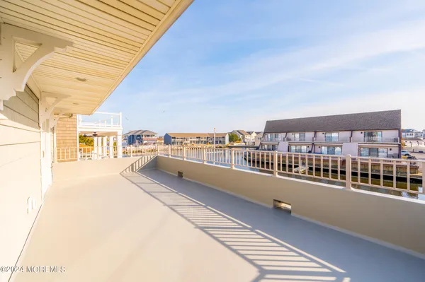 a view of a balcony with city view