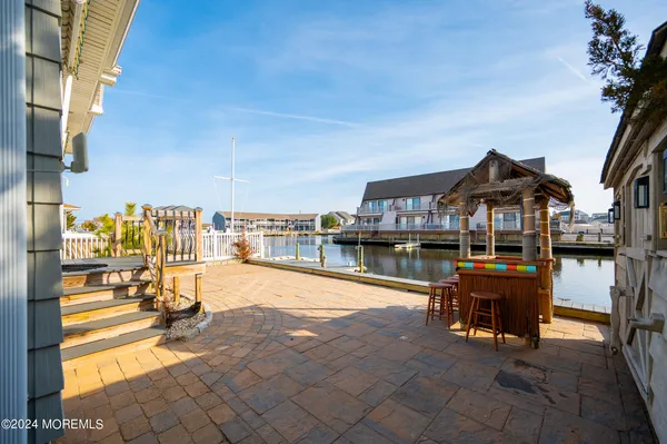 a view of a swimming pool with a lounge chair