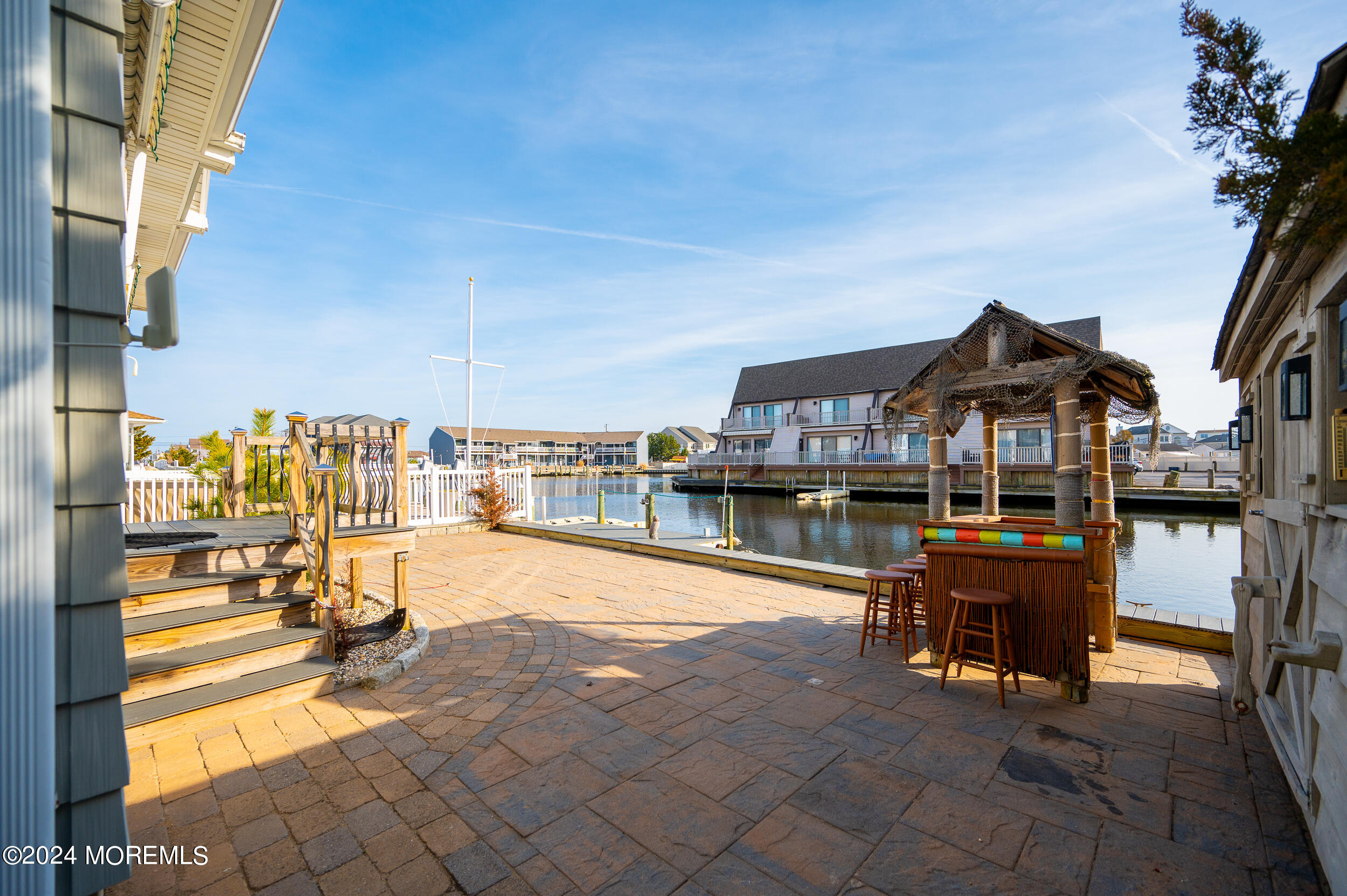 409 6th Avenue Seaside Heights, NJ 08751 - Photo 35 of 39 a view of a swimming pool with a lounge chair