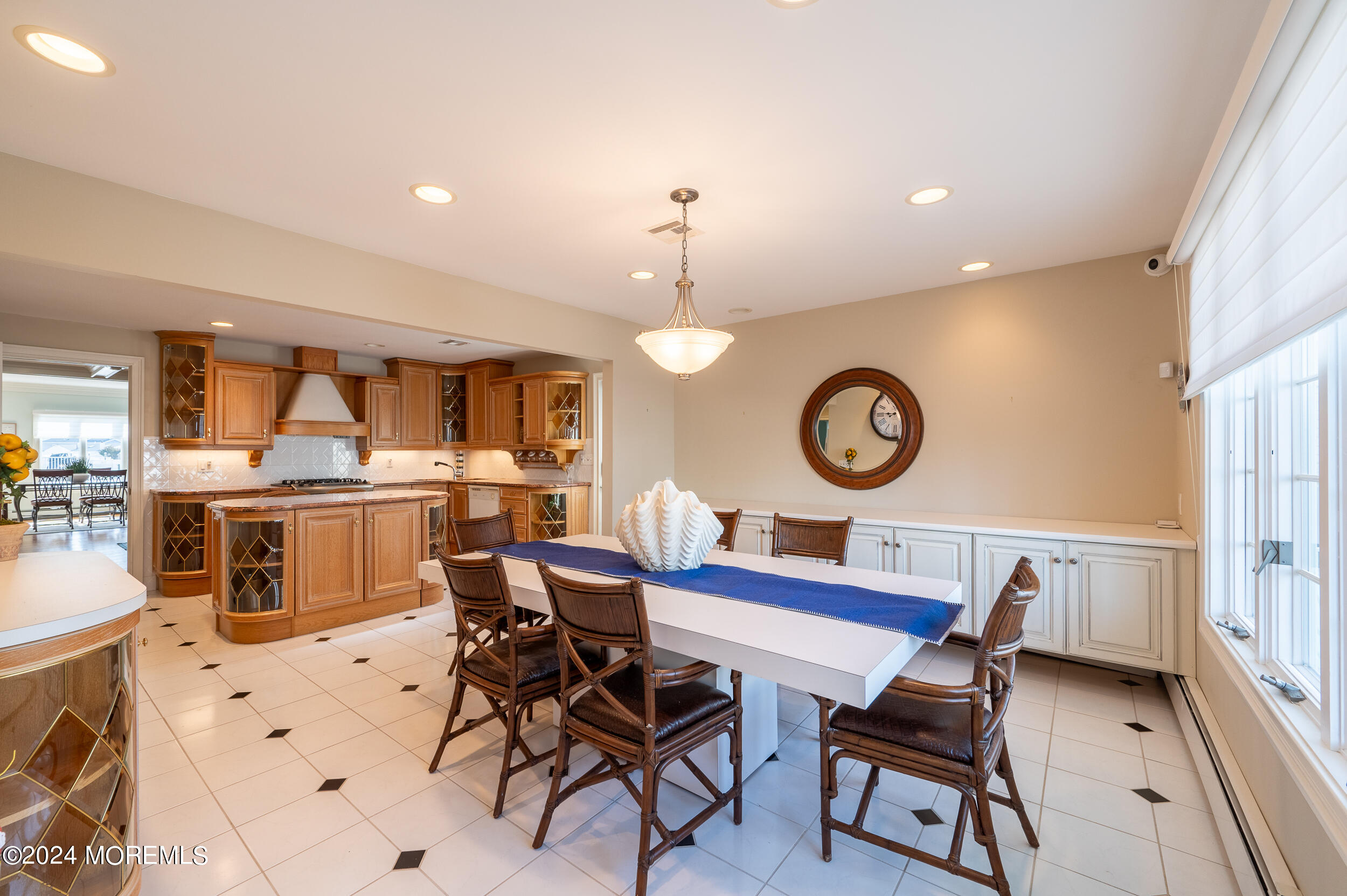 409 6th Avenue Seaside Heights, NJ 08751 - Photo 5 of 39 a view of a dining room with furniture and a large window