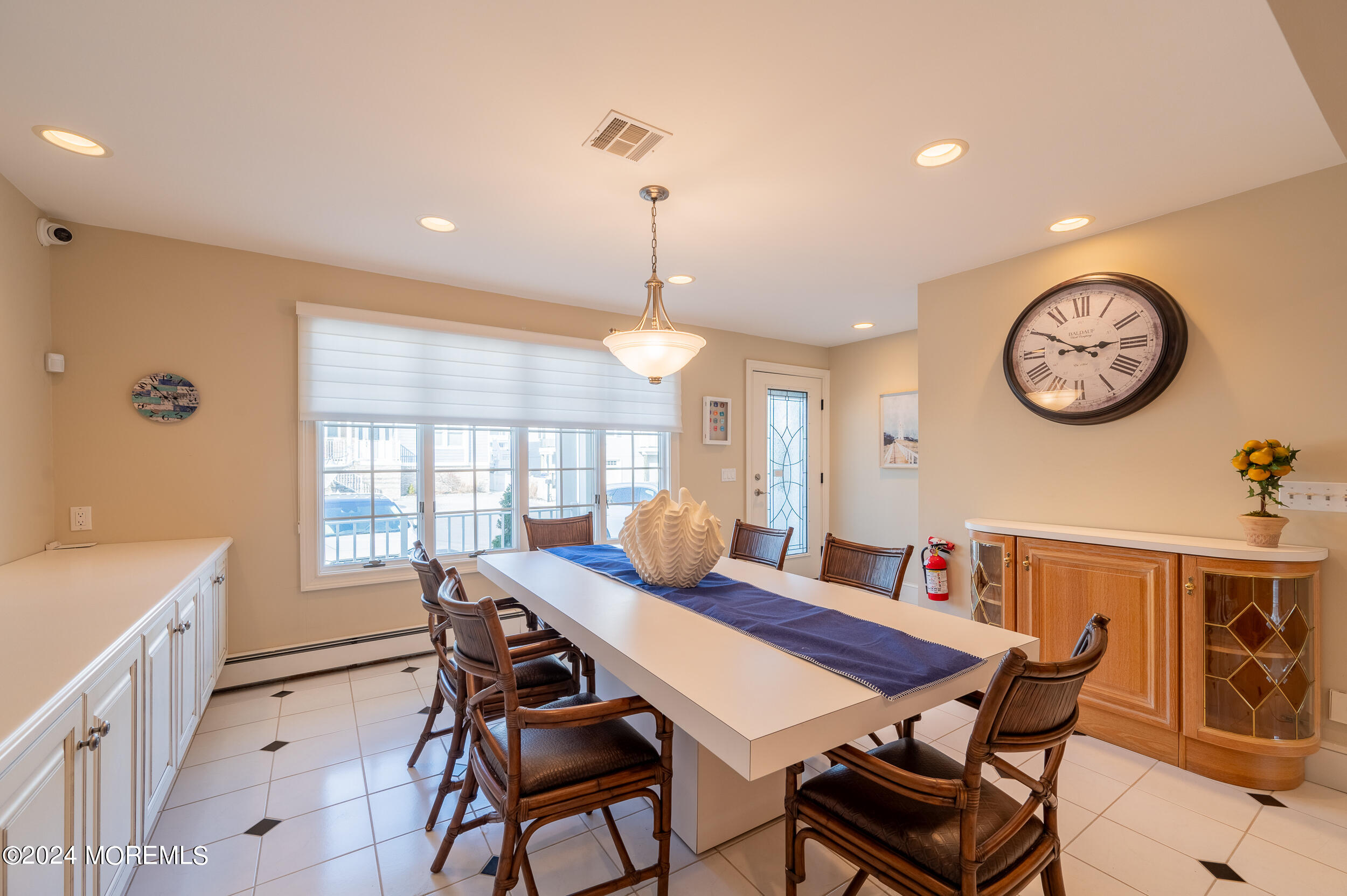 409 6th Avenue Seaside Heights, NJ 08751 - Photo 6 of 39 a dining room with furniture and a large window