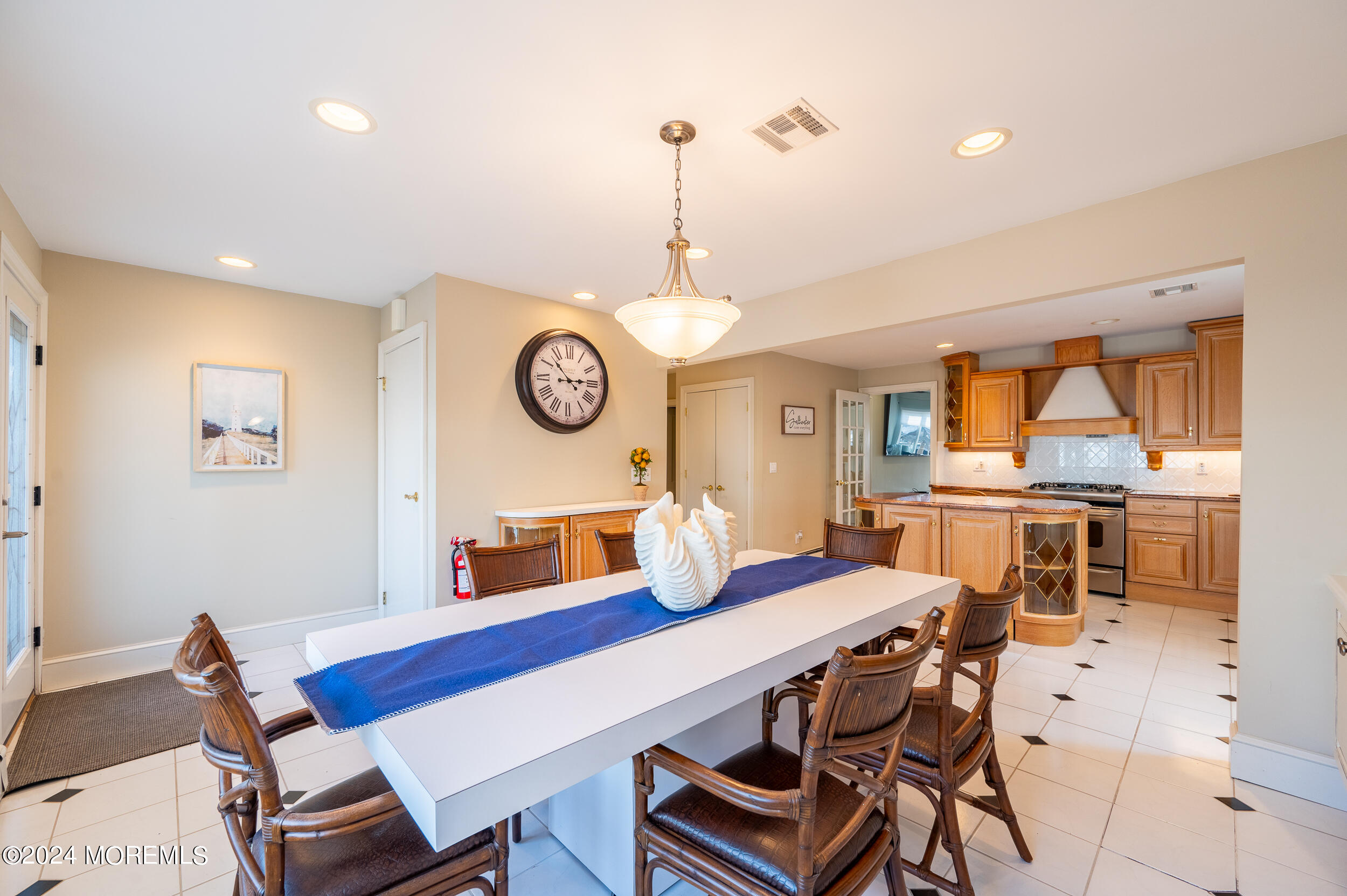 409 6th Avenue Seaside Heights, NJ 08751 - Photo 7 of 39 a view of a dining room with furniture and a large window