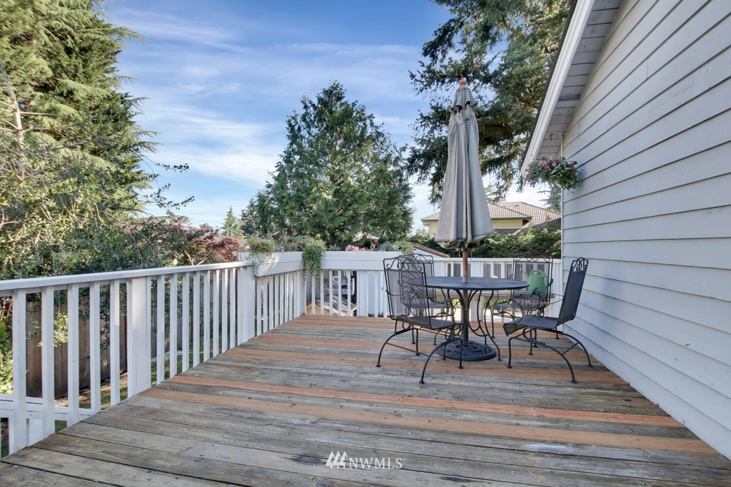 5624 Hazel Loop Southeast Auburn, WA 98092 - Photo 13 of 16 a view of a chairs and table in the balcony