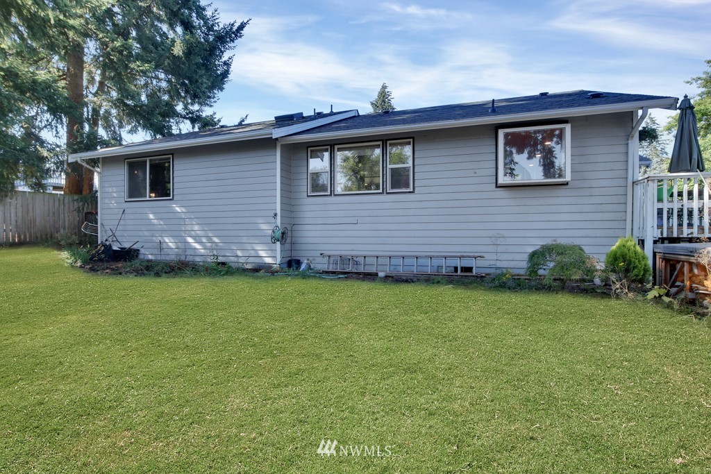5624 Hazel Loop Southeast Auburn, WA 98092 - Photo 15 of 16 a front view of a house with garden