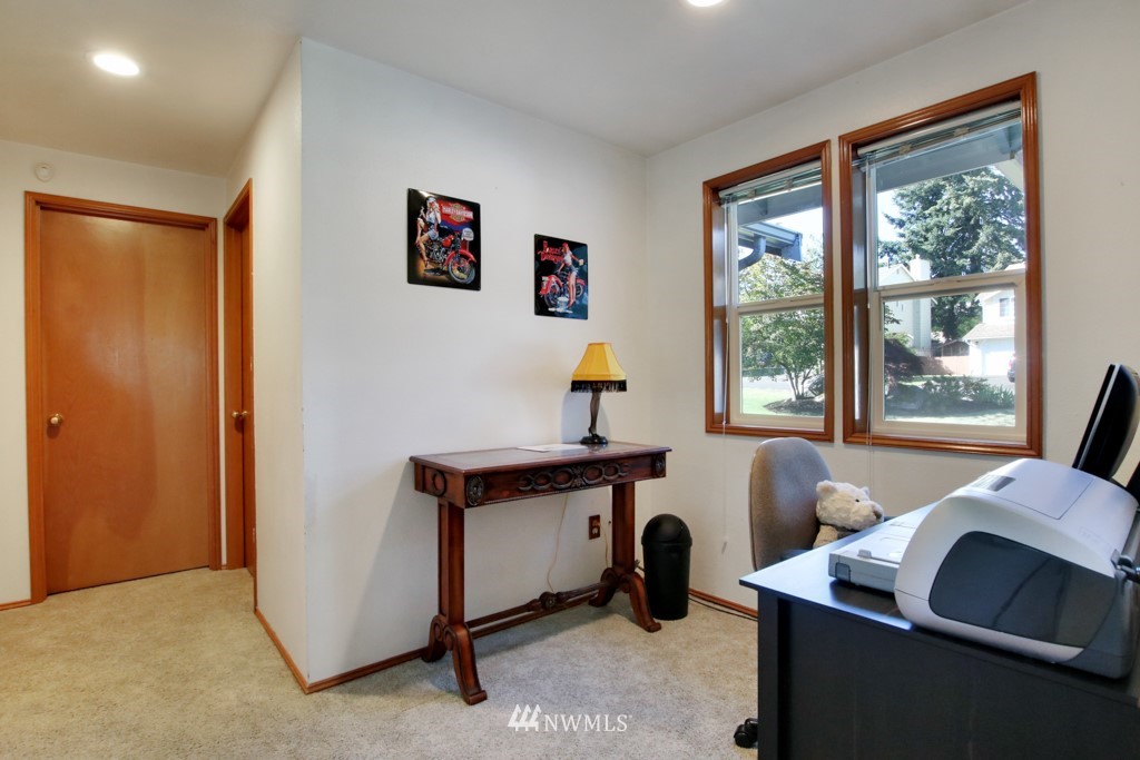 5624 Hazel Loop Southeast Auburn, WA 98092 - Photo 9 of 16 a view of a workspace with furniture and a window