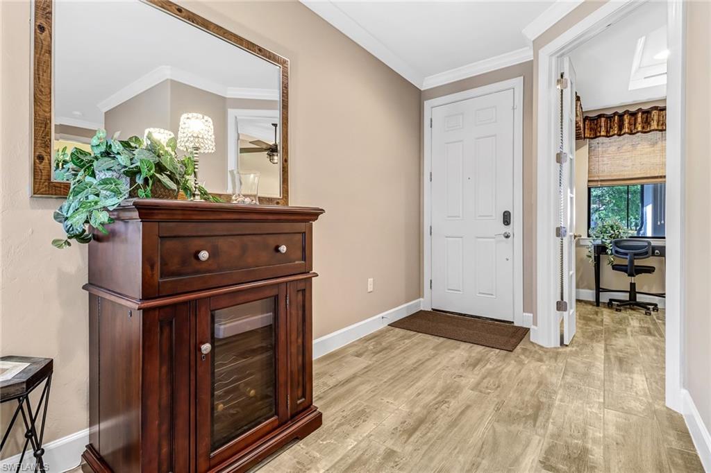 20321 Corkscrew Shores Boulevard Estero, FL 33928 - Photo 11 of 38 a view of an entryway with wooden floor