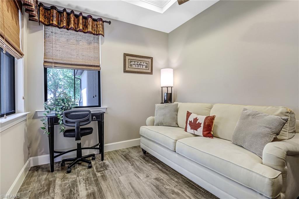 20321 Corkscrew Shores Boulevard Estero, FL 33928 - Photo 21 of 38 a living room with furniture and a window