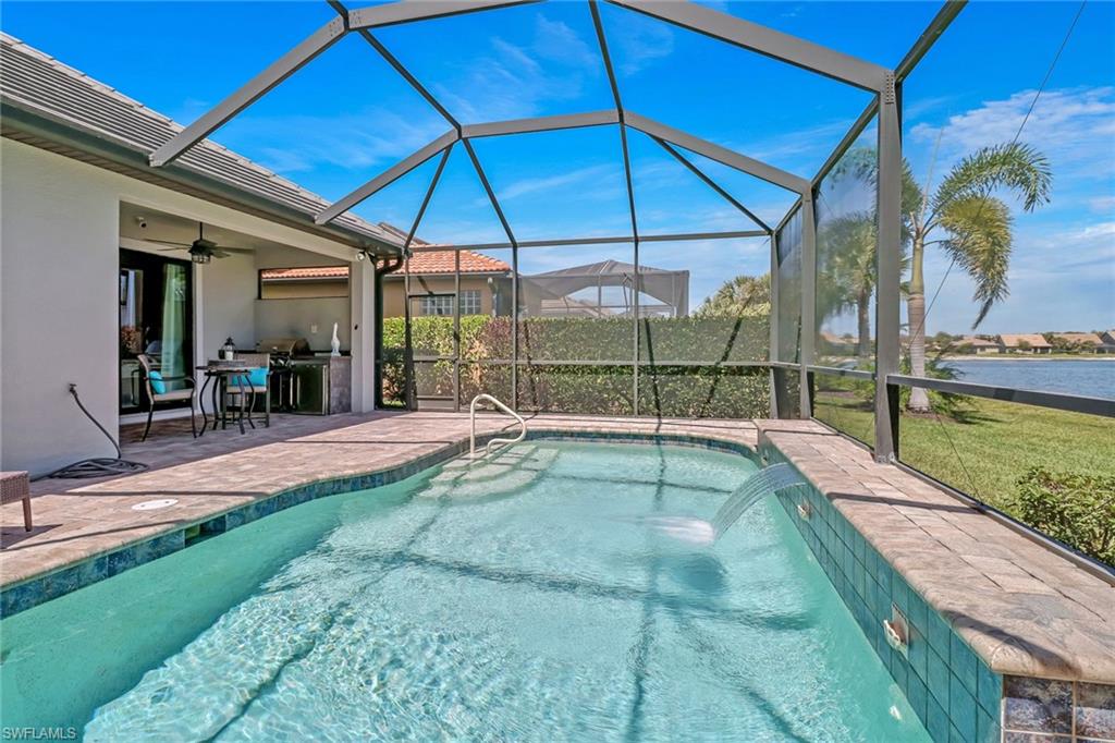 20321 Corkscrew Shores Boulevard Estero, FL 33928 - Photo 25 of 38 a view of a house with a yard
