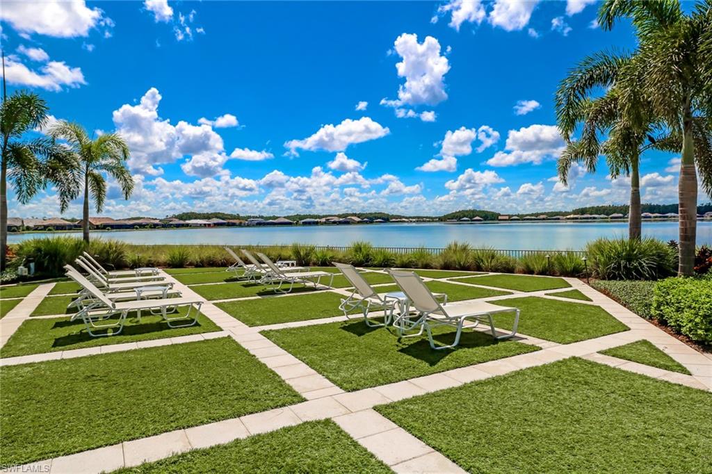 20321 Corkscrew Shores Boulevard Estero, FL 33928 - Photo 28 of 38 a view of a backyard with swimming pool and patio