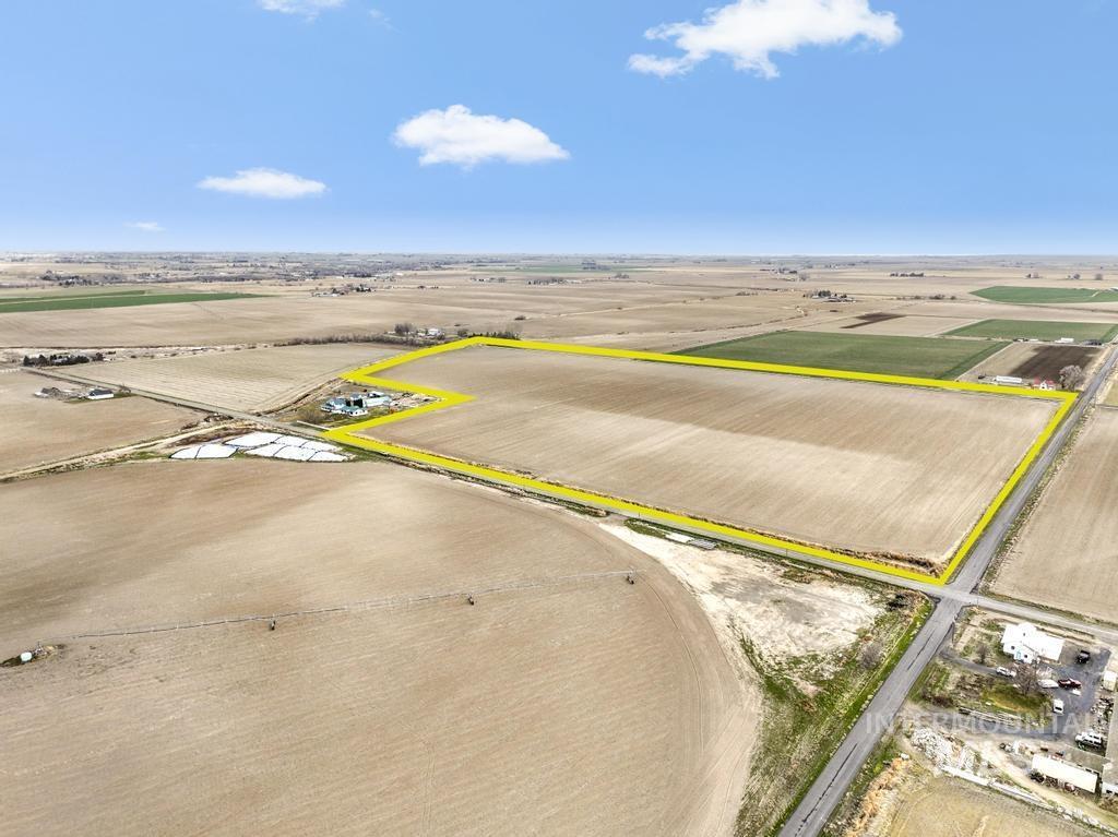 3900 North (52 /- Acres) Filer, ID 83328 - Photo 26 of 29 Aerial view of sparsely populated area featuring property boundaries highlighted and large plots for crops