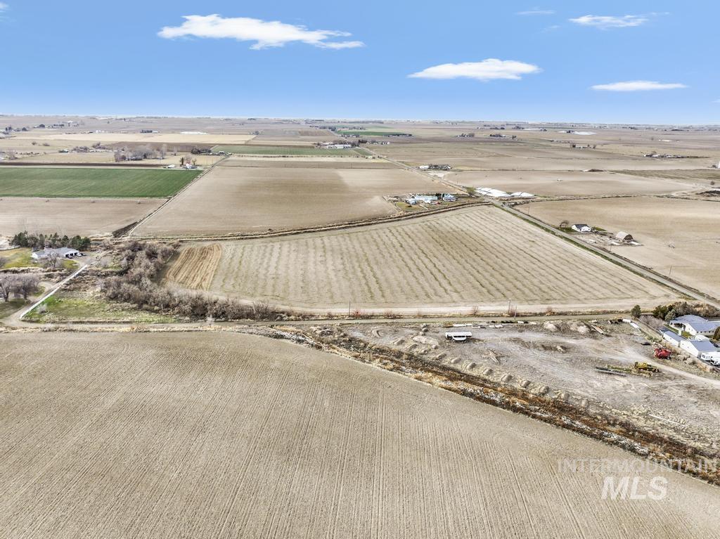3900 North (52 /- Acres) Filer, ID 83328 - Photo 7 of 29 Aerial view of sparsely populated area featuring large plots for crops
