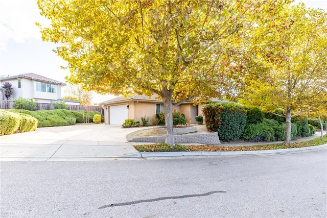 a view of a house with a street