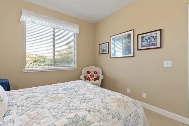 a bathroom with a sink vanity and mirror