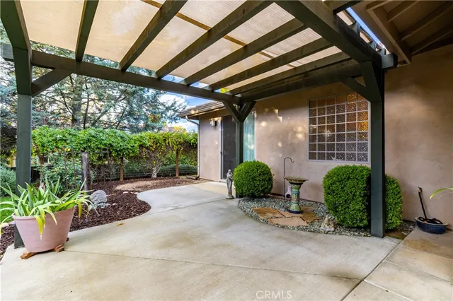 a view of yard with patio