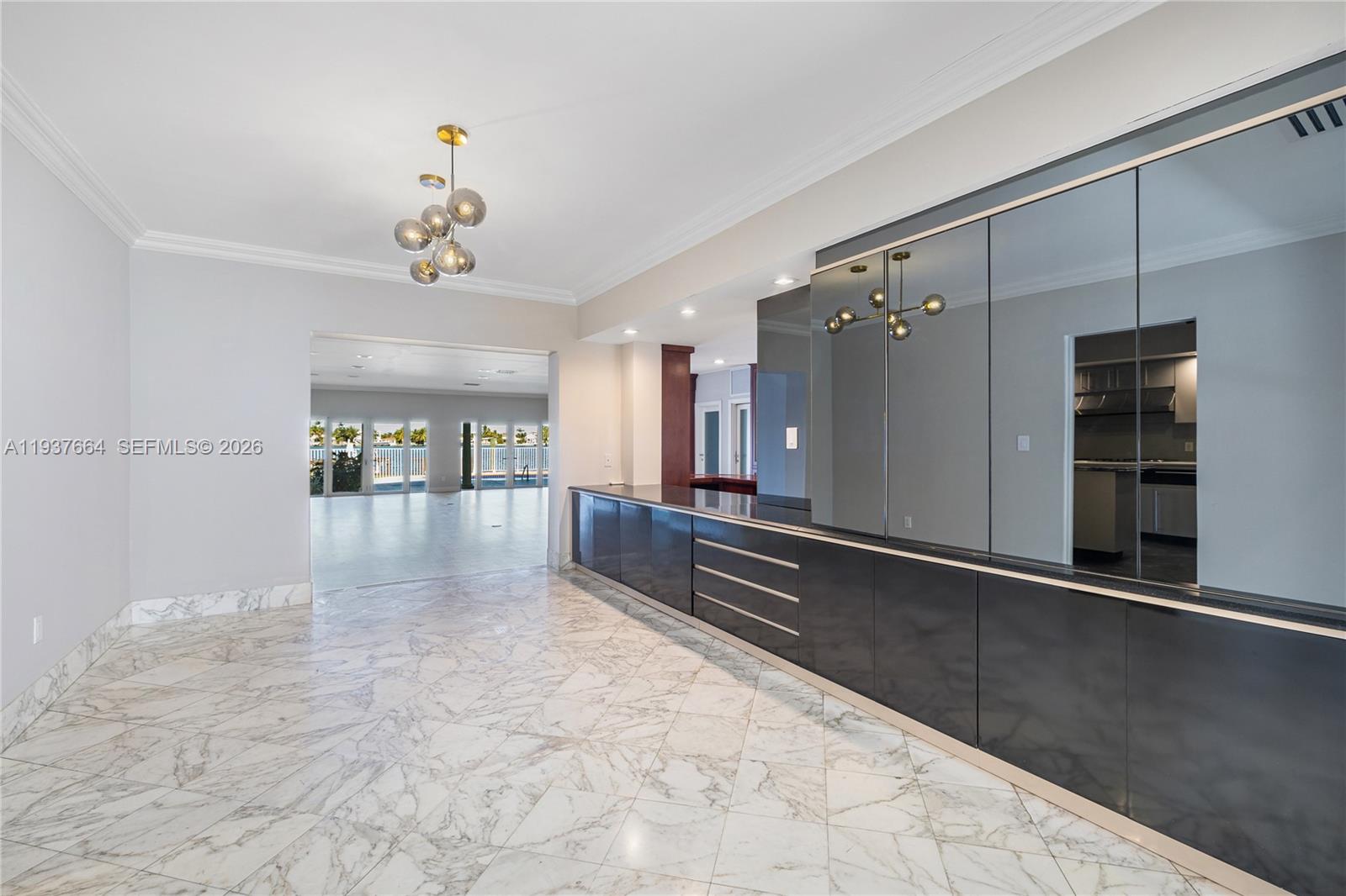 1375 North Biscayne Point Road Miami Beach, FL 33141 - Photo 11 of 40 a view of livingroom with kitchen