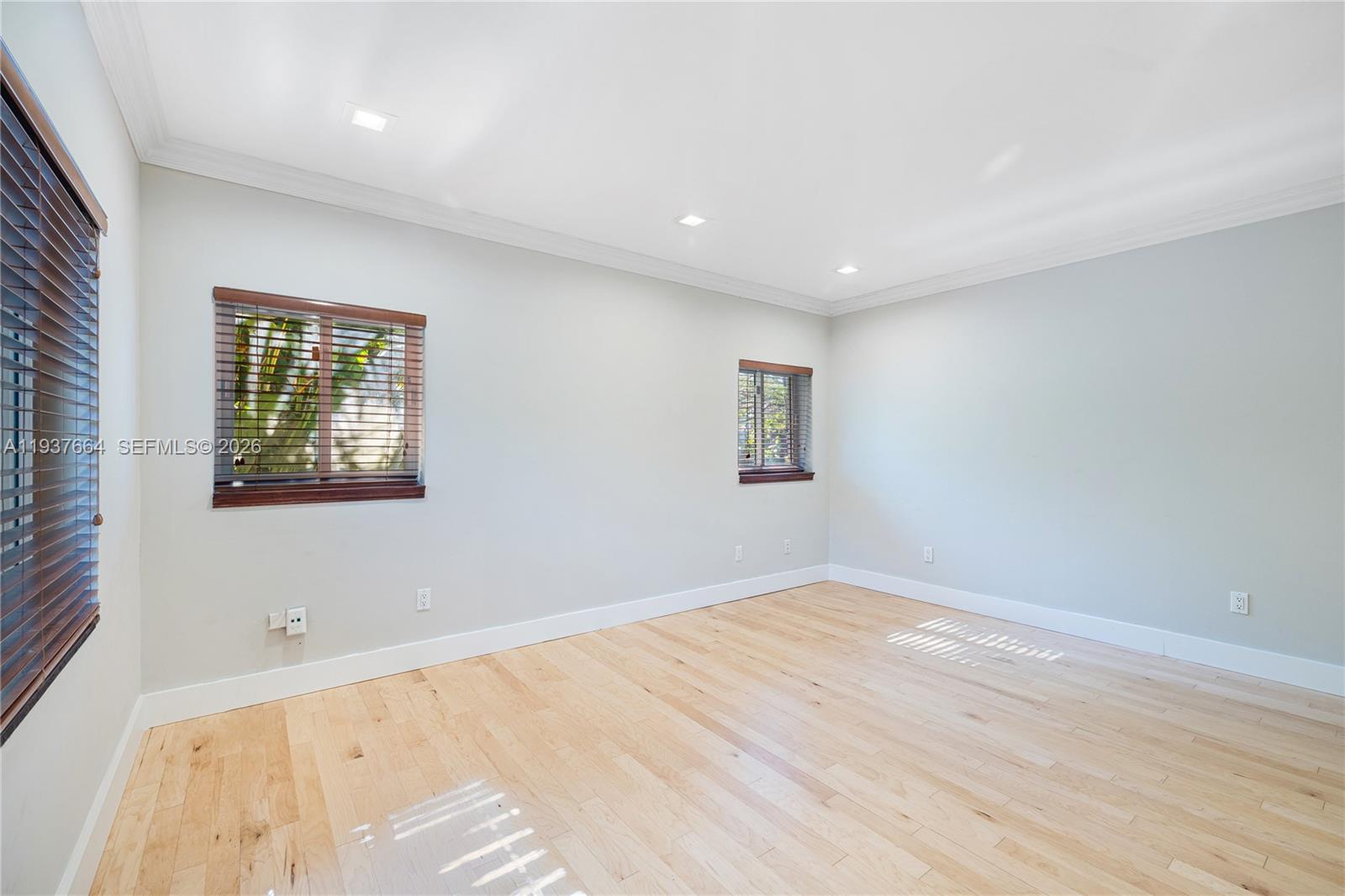 1375 North Biscayne Point Road Miami Beach, FL 33141 - Photo 22 of 40 a view of an empty room with a window