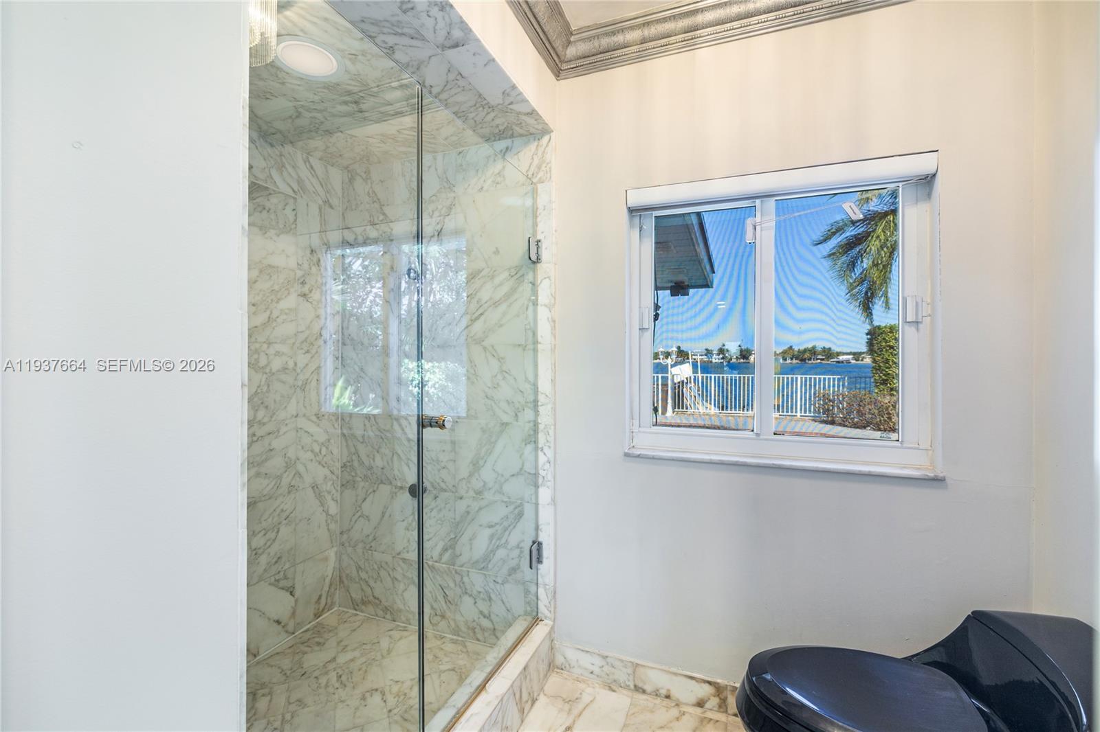 1375 North Biscayne Point Road Miami Beach, FL 33141 - Photo 23 of 40 a bathroom with a shower