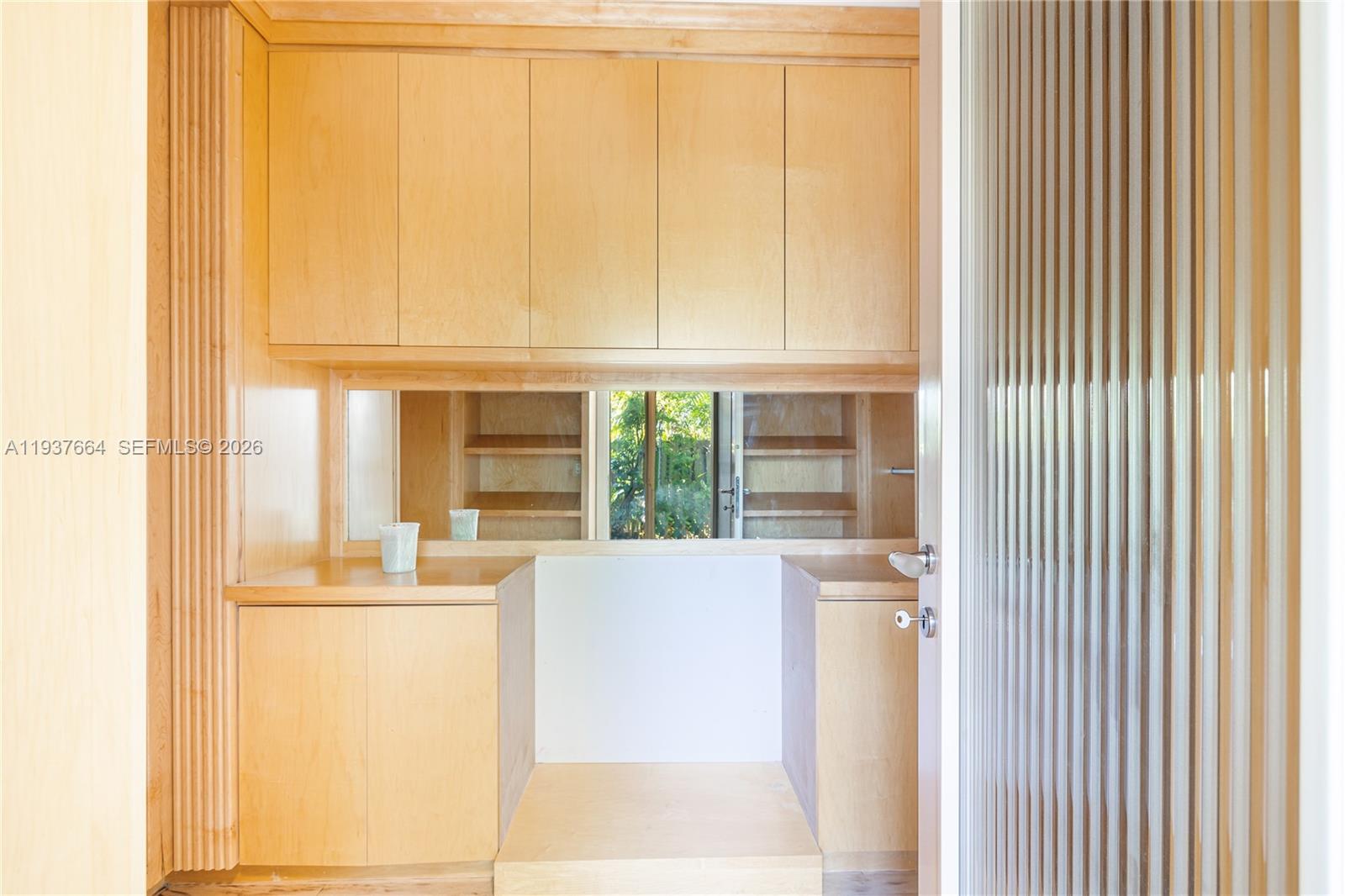 1375 North Biscayne Point Road Miami Beach, FL 33141 - Photo 26 of 40 a view of a kitchen with a window