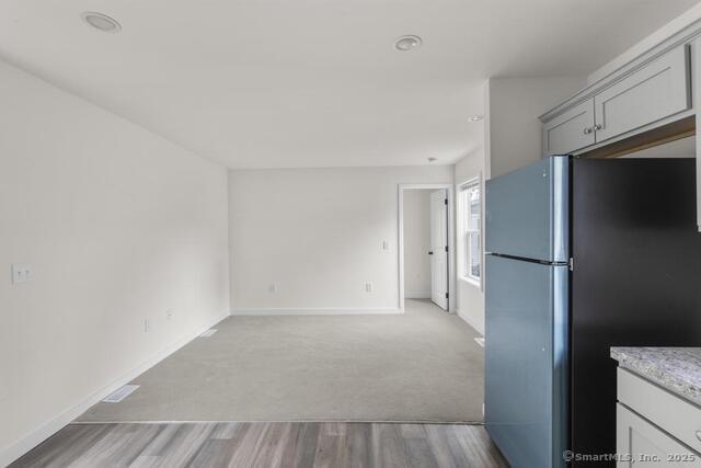 55 Sugar Street, Unit 33 Newtown, CT 06470 - Photo 6 of 17 a view of an empty room