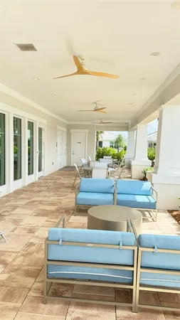 a view of living room with furniture and window