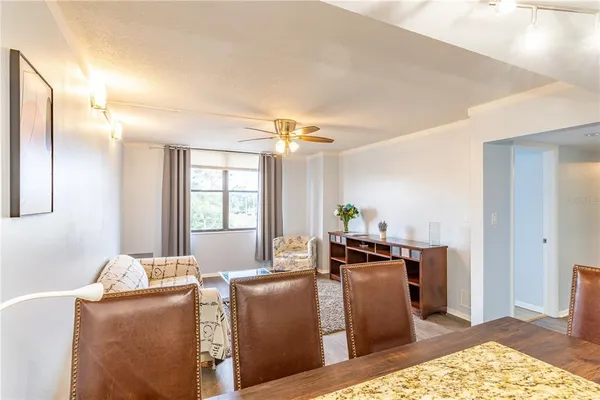 a living room with a couch and a window